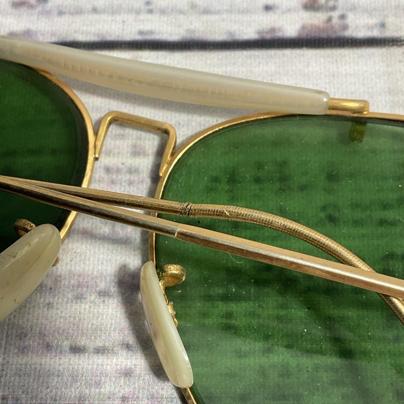 VTG. Bushnell 755 Activewear Shooting Gold Tone Sunglasses w/ Green Lenses