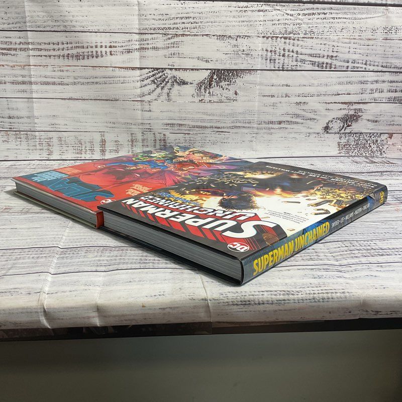 Lot Of 2 Deluxe Hardcover Comics Superman Unchained New 52, JLA Tower Of Babel