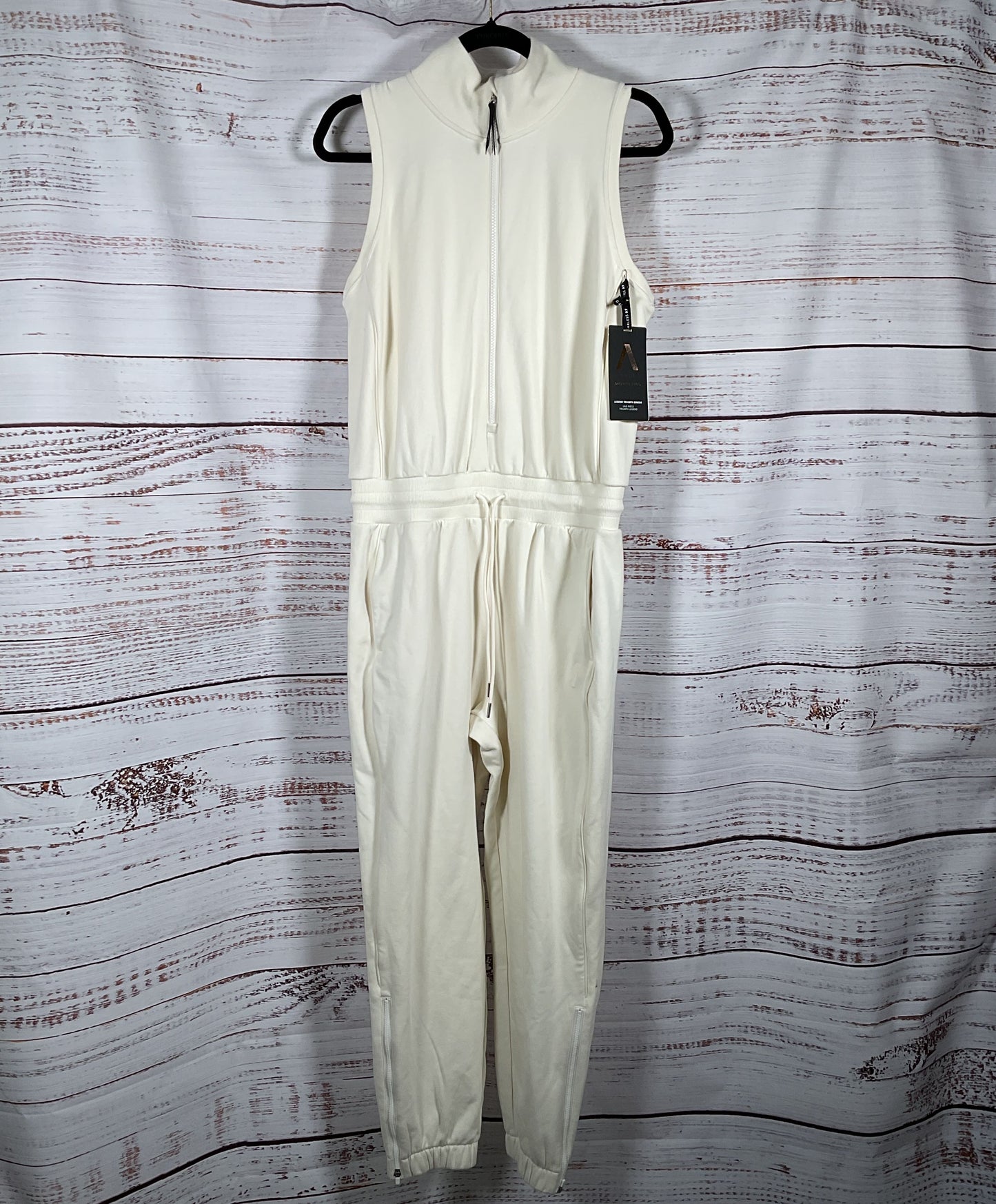 Athleta Allyson Felix Legend Triumph Onesie Cream M