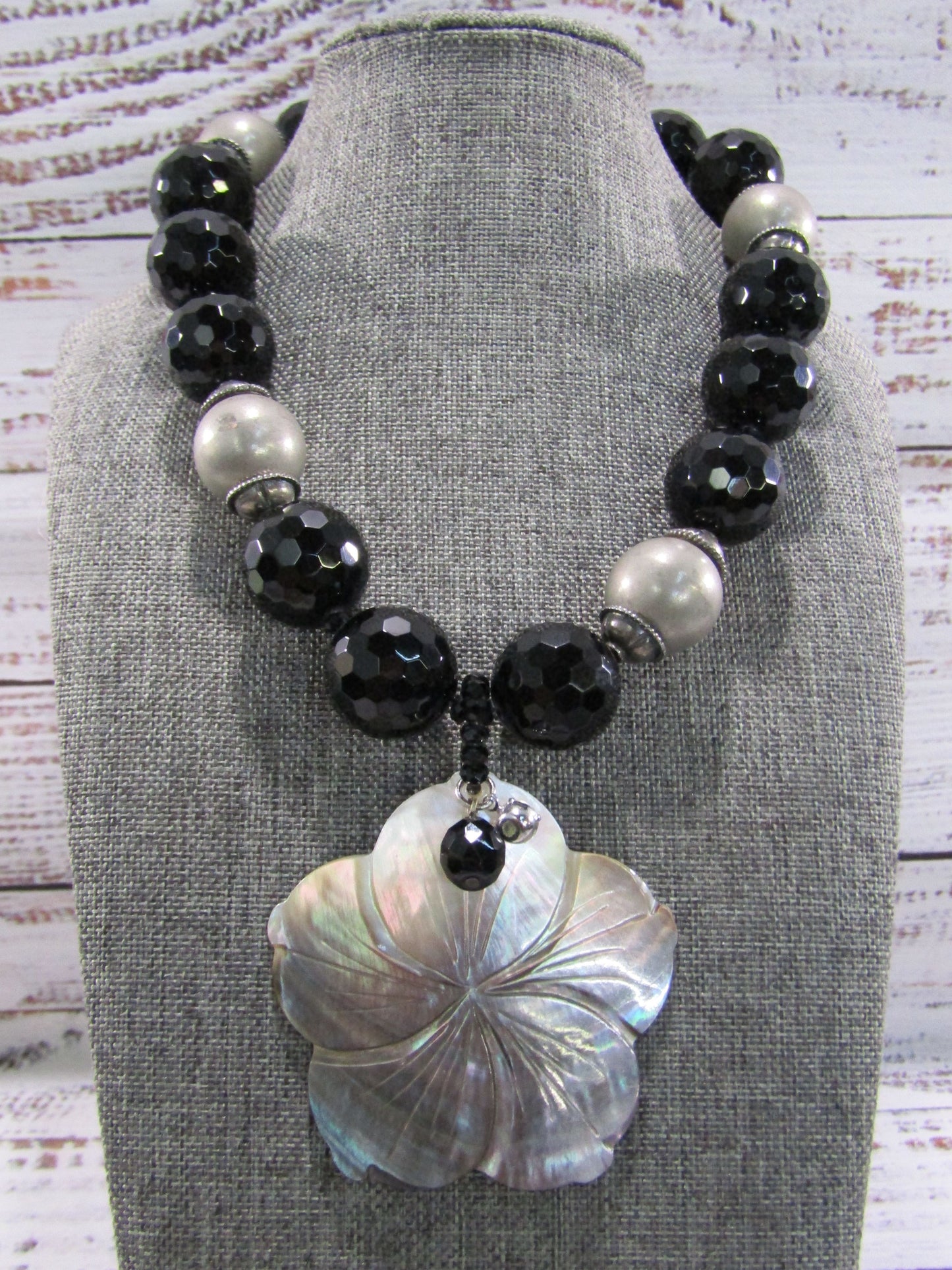 Faceted Onyx Beaded Necklace With Floral Carved Mother of Pearl Pendant