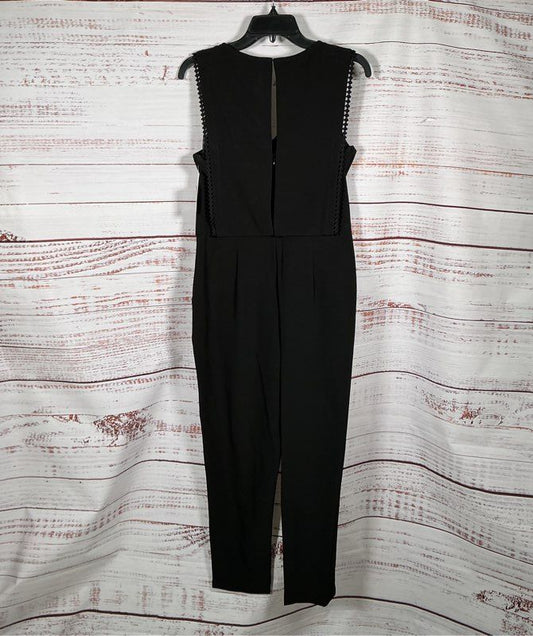 NWT Taylor Black Sleeveless Jumpsuit with bib overlay front Size 6
