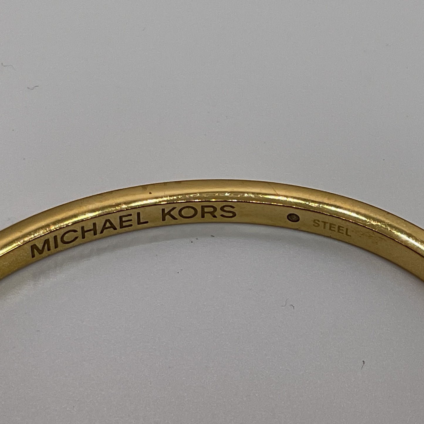 MICHAEL KORS Gold Tone & Rhinestone Dangle Heart Bangle Bracelet- 6.5"