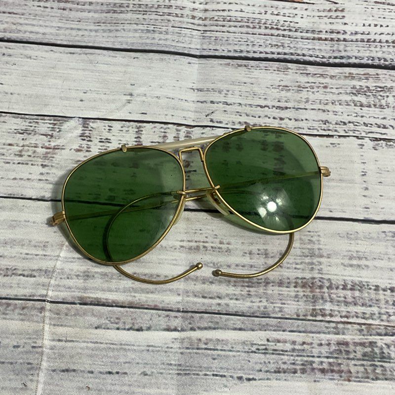 VTG. Bushnell 755 Activewear Shooting Gold Tone Sunglasses w/ Green Lenses
