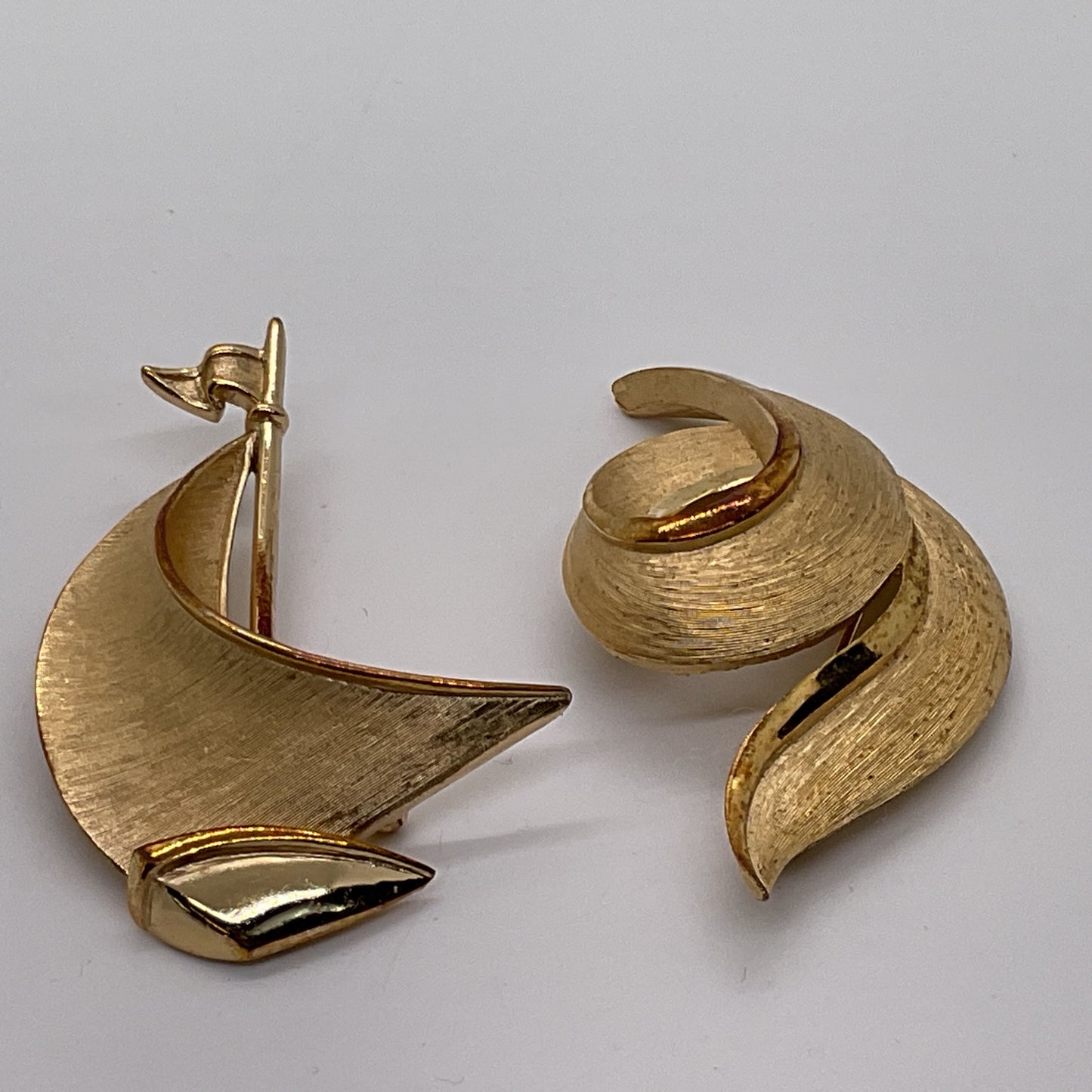 VTG. Crown TRIFARI Gold Tone Brushed 2.25" Sailboat & 2.5" Swirl Brooches