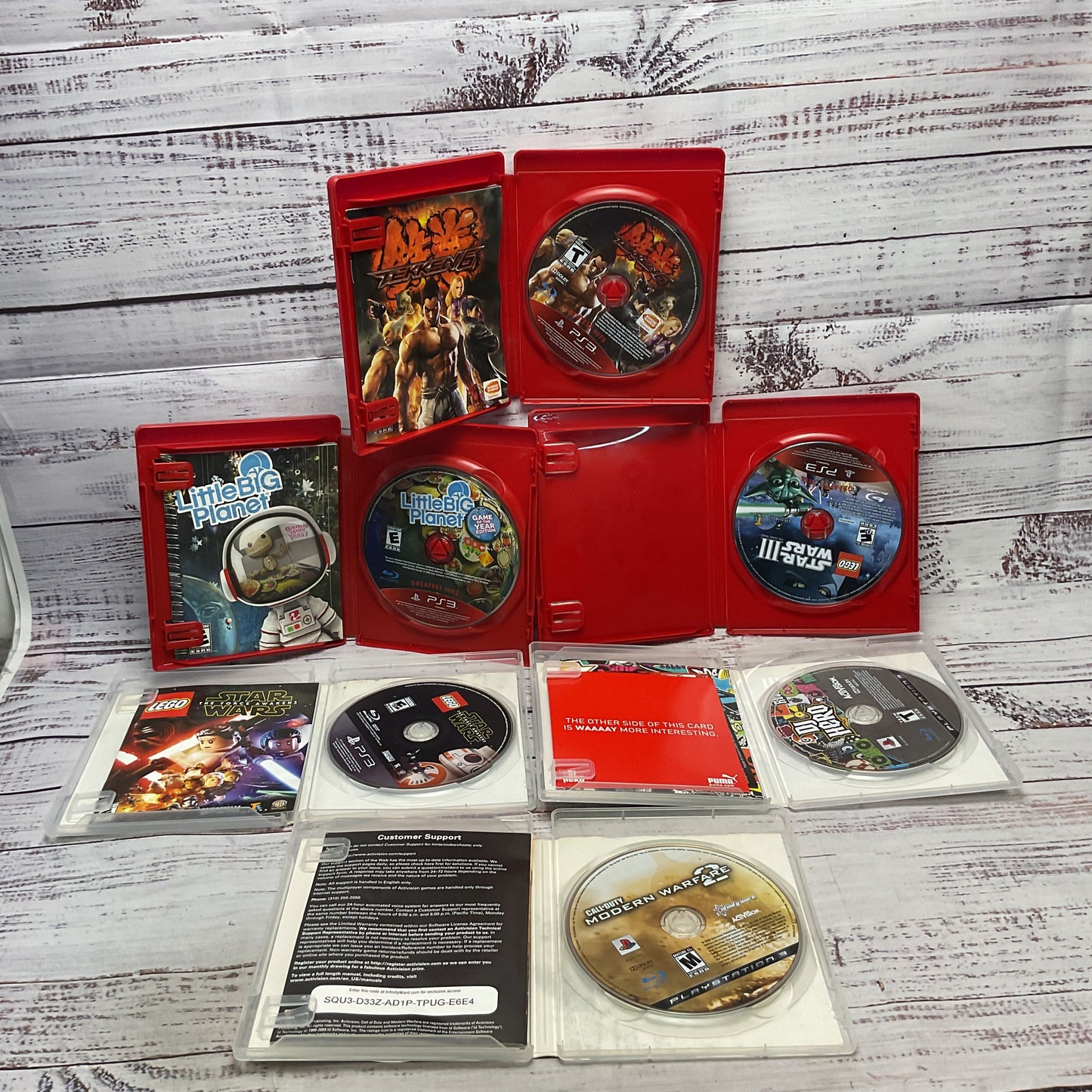 Sony Play Station 3 Mixed Games Lot COD MW2 Star Wars Little Big Planet Tekken 6