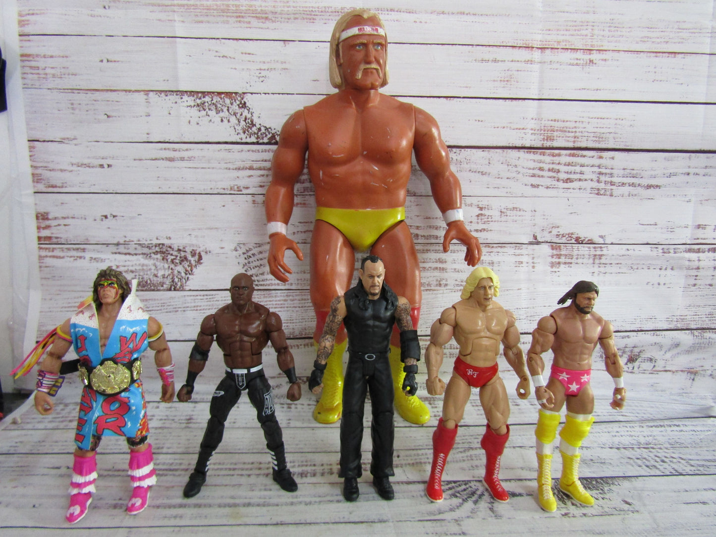 Lot of 6 WWE Action Figures Undertaker Bobby Lashley Macho Man Ultimate Warrior