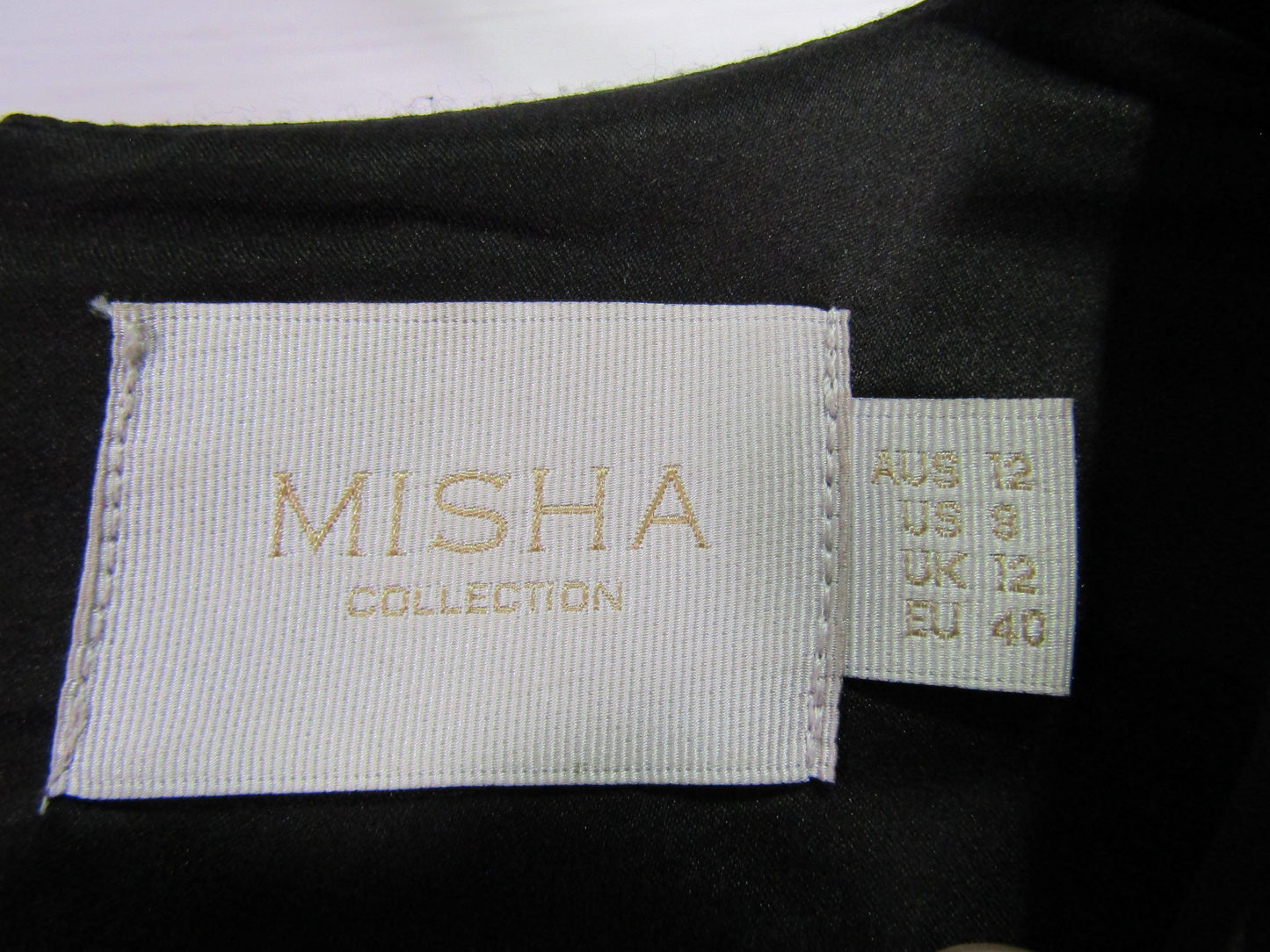 Misha Women's Black Unhemmed Blouse Size 8