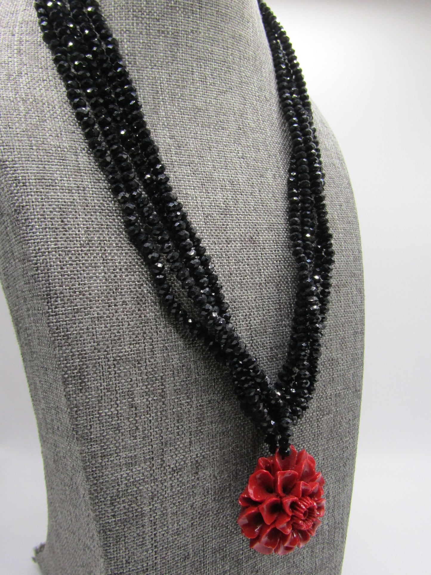 Handcrafted Multi-Strand Faceted Black Rhinestone Floral Carved Resin Necklace