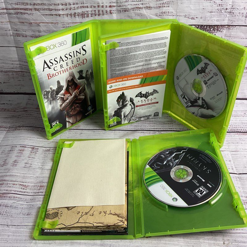 Microsoft Xbox 360 3 pc. Game Bundle (AC Brotherhood Batman Arkham City Skyrim)