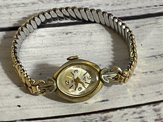 VTG. HELBROS Women's Gold Tone Stretch Band Watch