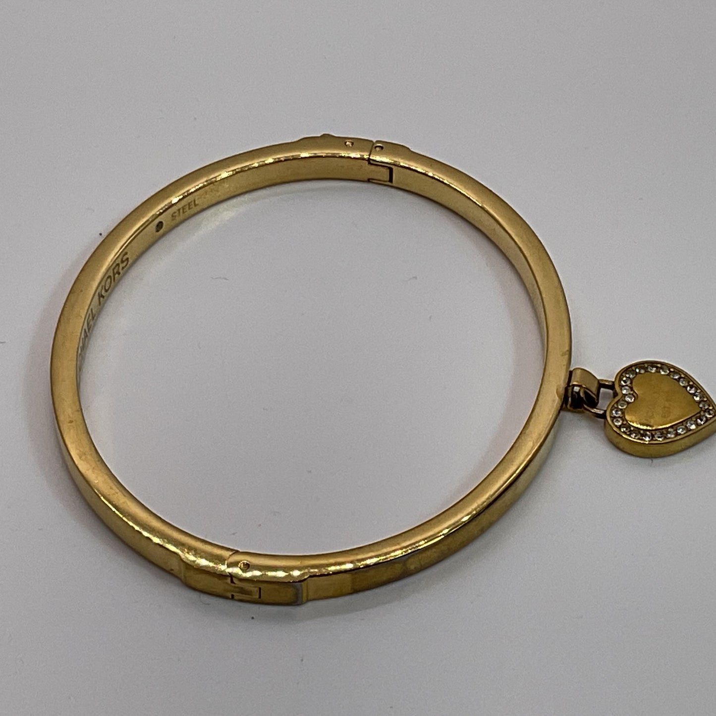MICHAEL KORS Gold Tone & Rhinestone Dangle Heart Bangle Bracelet- 6.5"