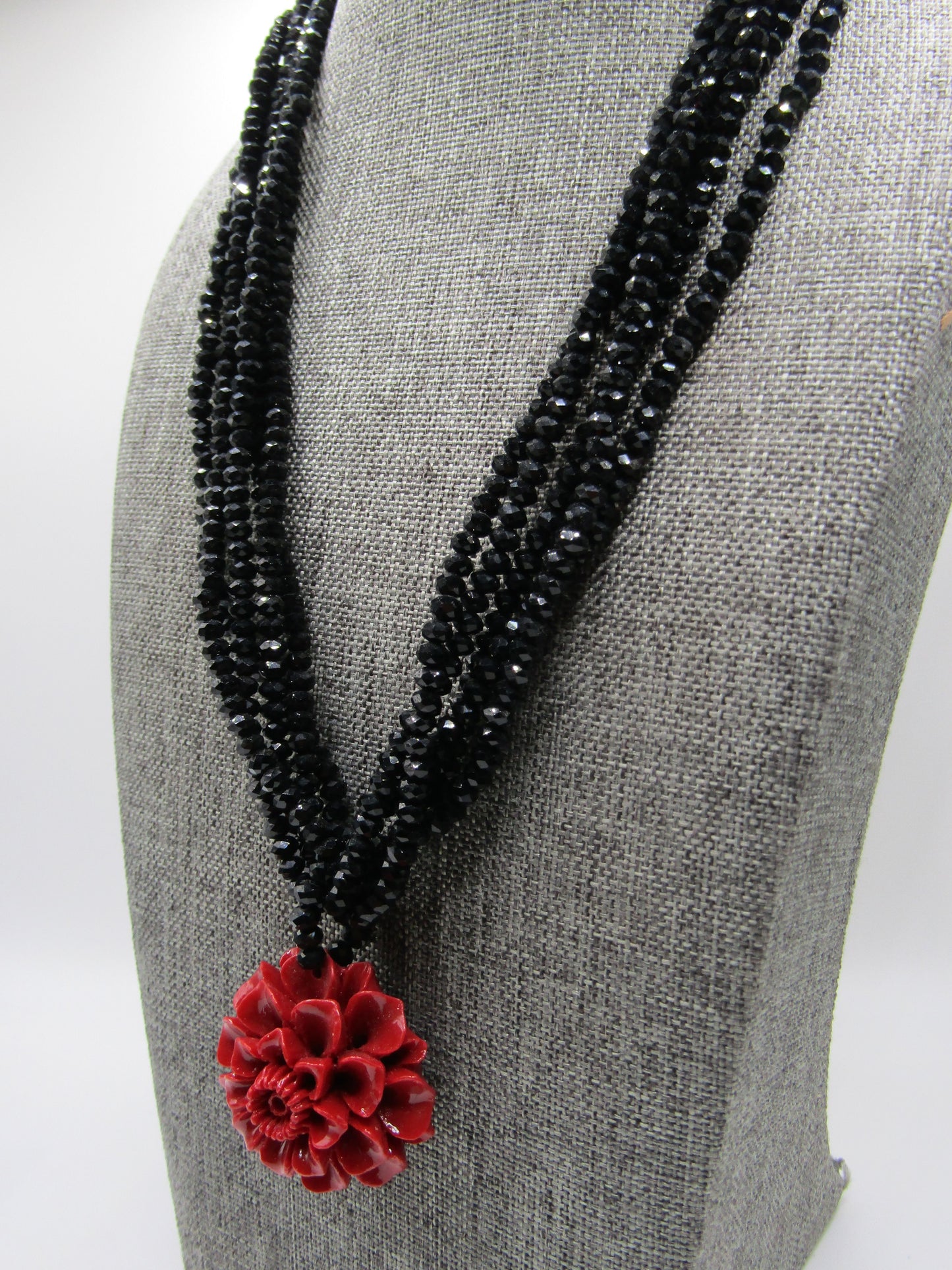 Handcrafted Multi-Strand Faceted Black Rhinestone Floral Carved Resin Necklace