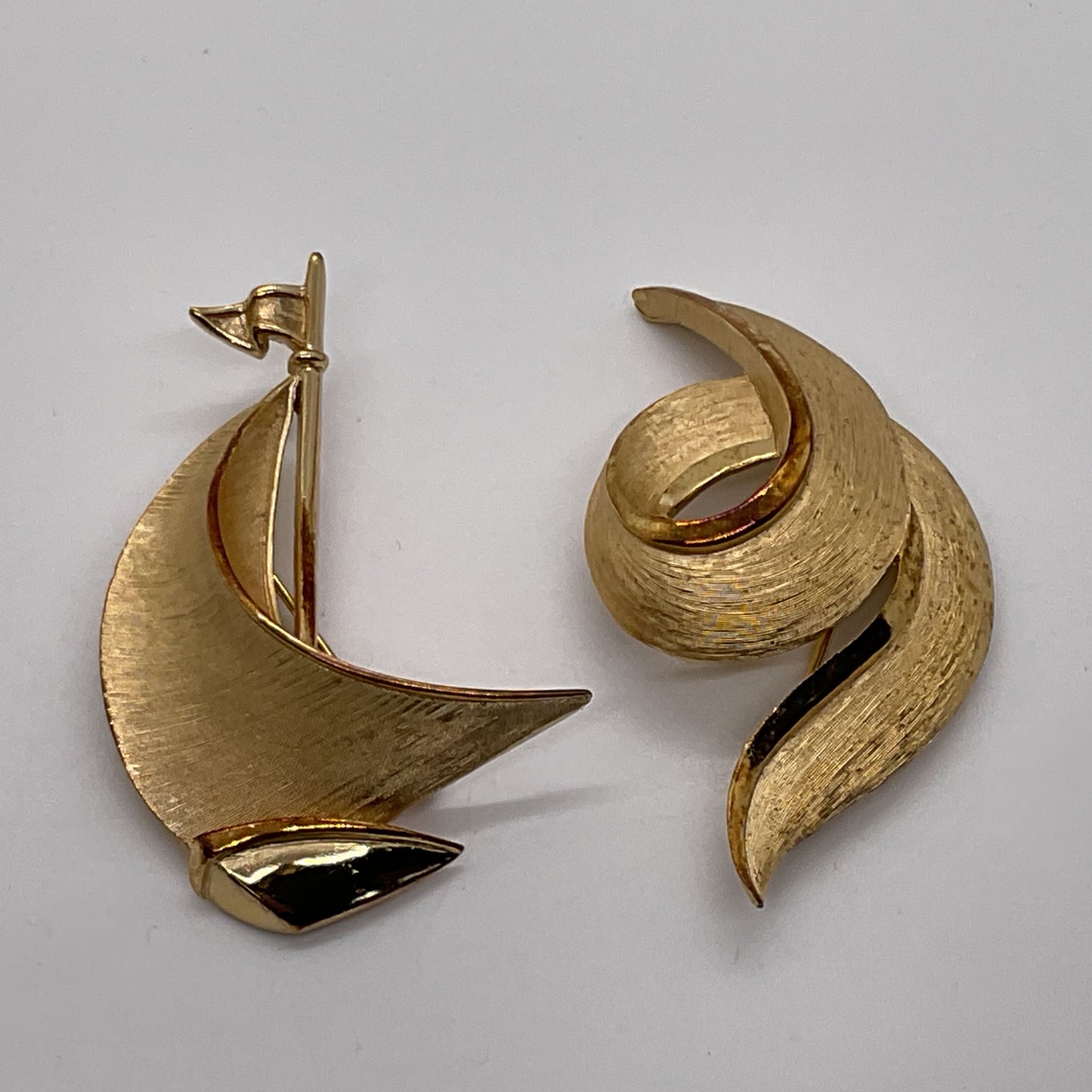 VTG. Crown TRIFARI Gold Tone Brushed 2.25" Sailboat & 2.5" Swirl Brooches
