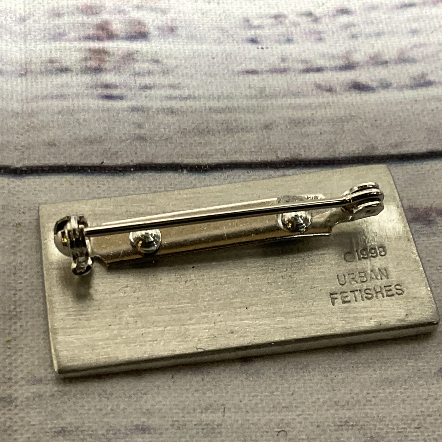 VTG. 1998 URBAN FETISHES Silver Tone Brooch- 1.5"