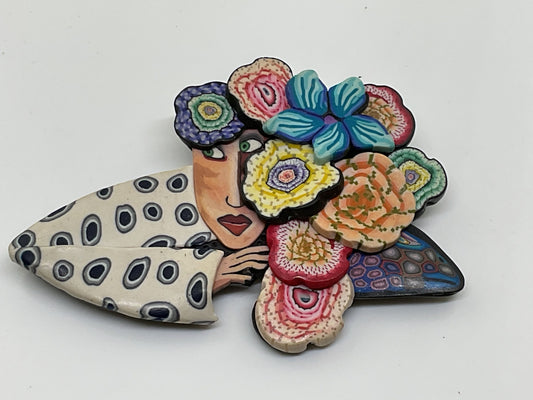 VTG. GG Artisan Woman with Floral Headpiece Rubber Brooch- 2.75"