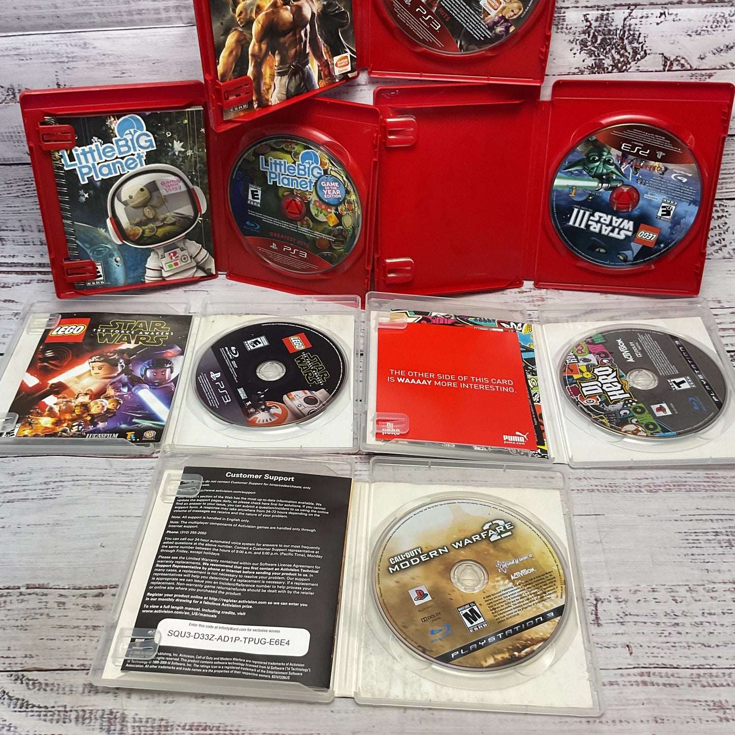 Sony Play Station 3 Mixed Games Lot COD MW2 Star Wars Little Big Planet Tekken 6