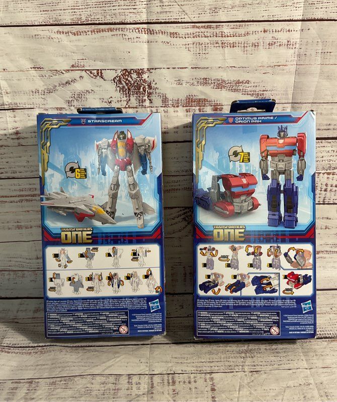New Optimus Prime & Starscream Transformers One Action Figures Hasbro