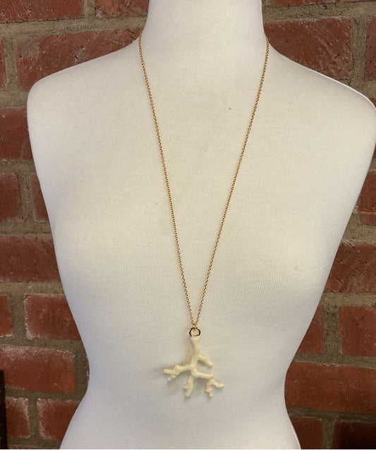 Trina Turk Gold Tone Long Chain Necklace with White Coral Shape Pendant