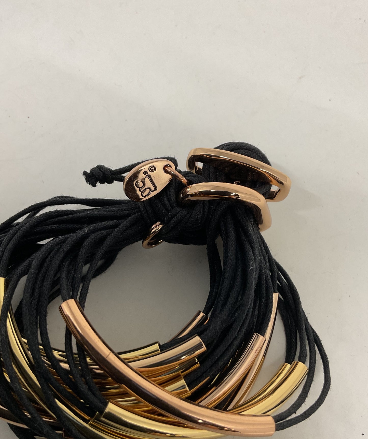 GILLIAN JULIUS Gold Tone Multi Strand Black Cord Bracelet