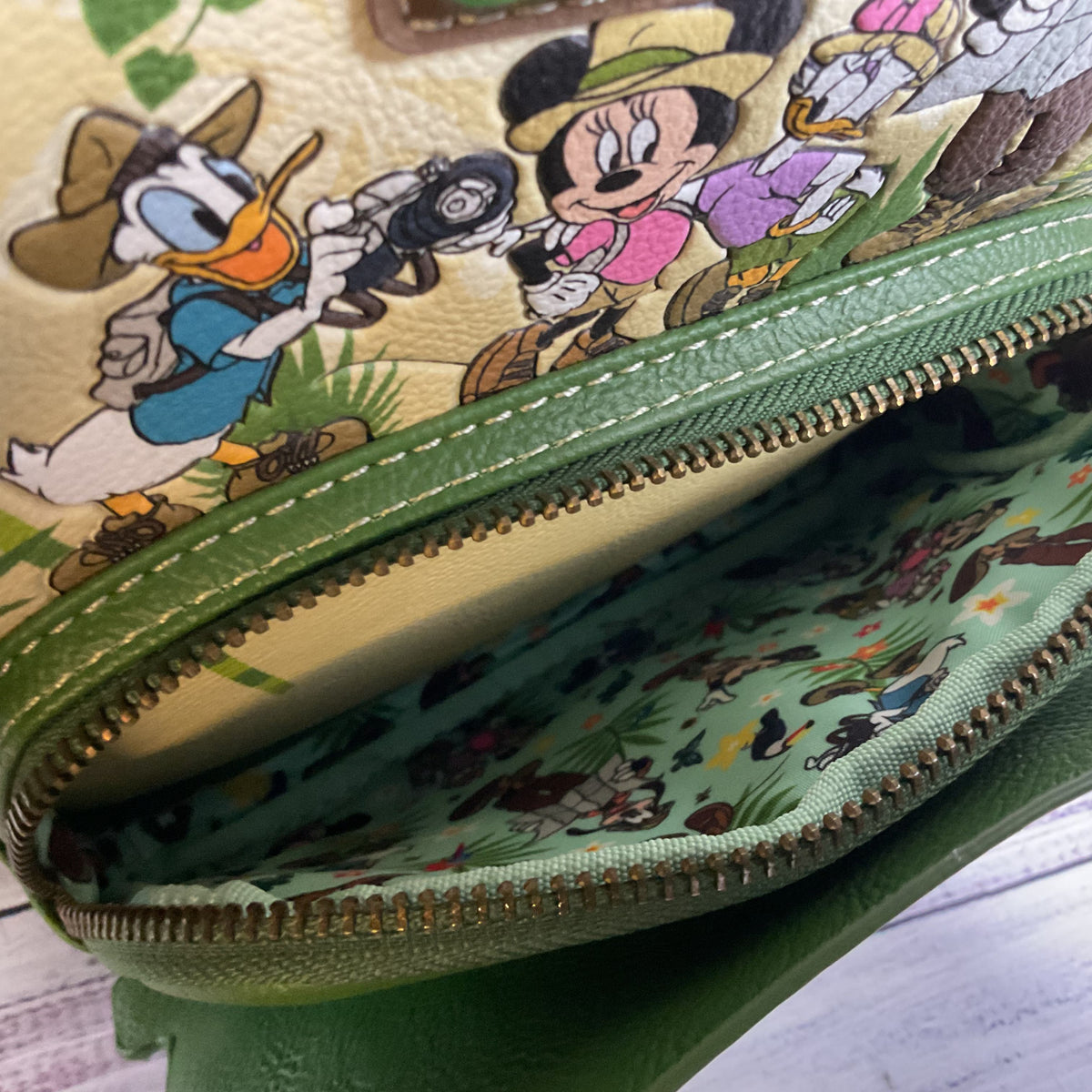 LOUNGEFLY Disney Mickey Friends Jungle Safari Glow in the Dark Backpack