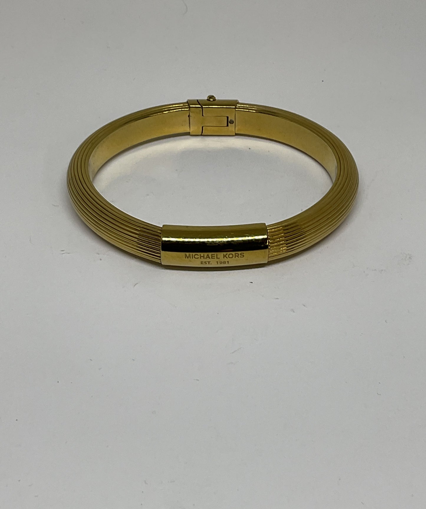MICHAEL KORS Gold Tone Hinged Bangle Bracelet