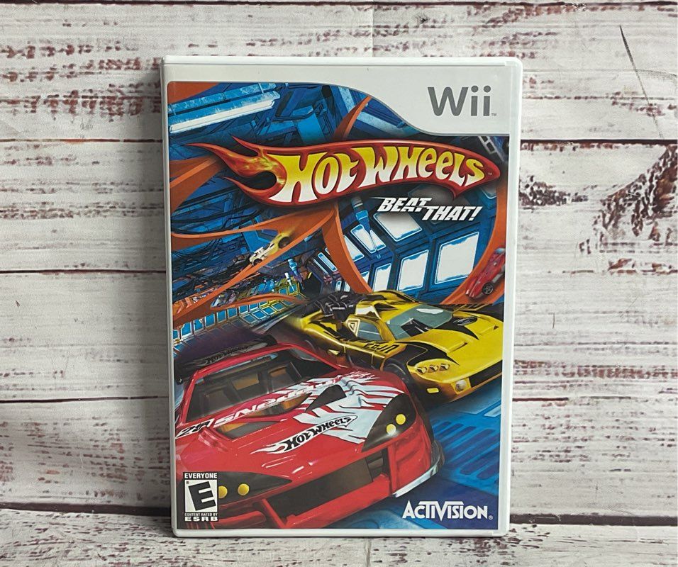 Nintendo Wii Lot of 2 Tiger Woods PGA tour Hot Wheels Video Games