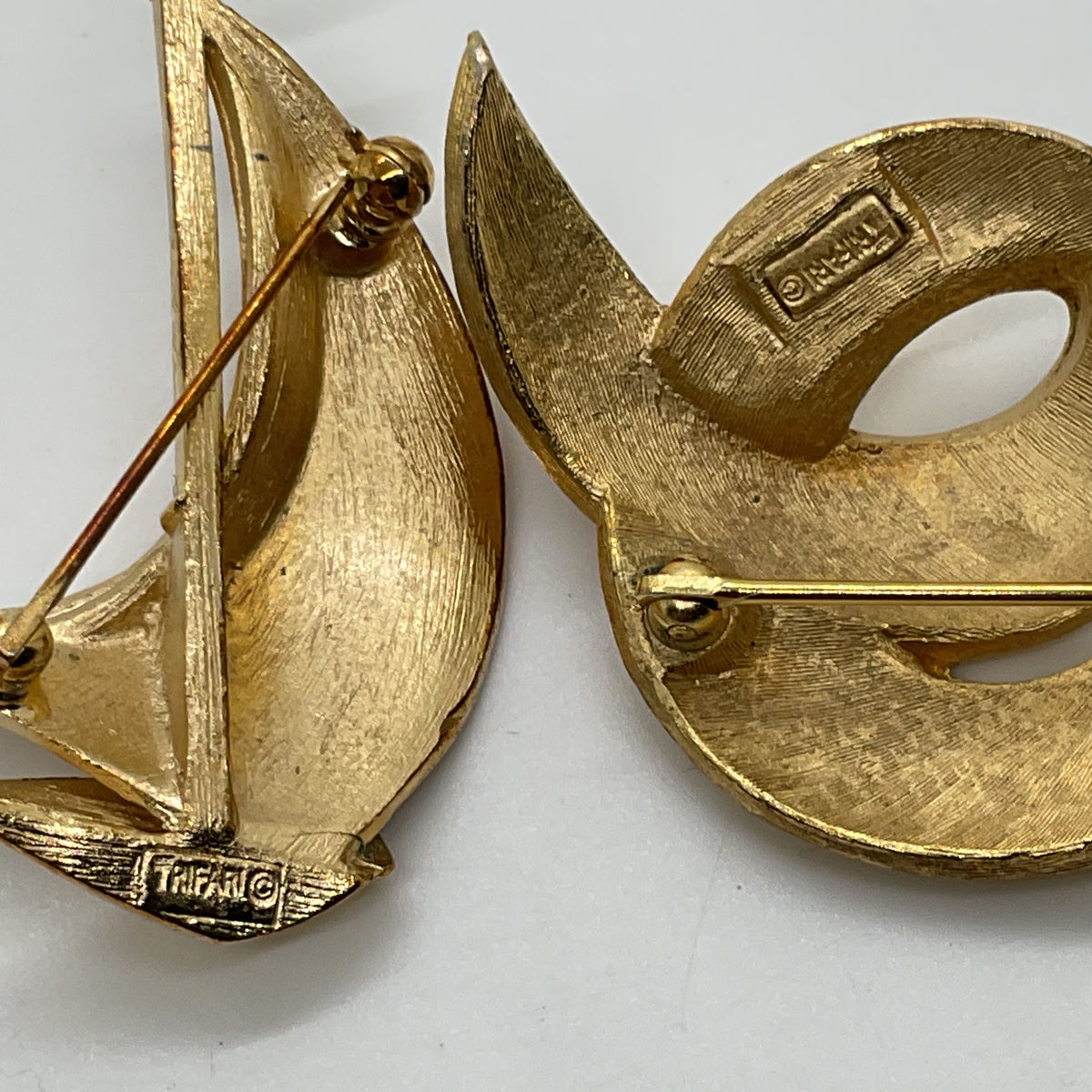 VTG. Crown TRIFARI Gold Tone Brushed 2.25" Sailboat & 2.5" Swirl Brooches