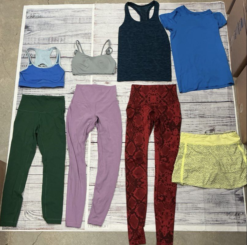 Women's Lululemon Lot of 8 Leggings, Skirt Tops and Sports Bras Size 4