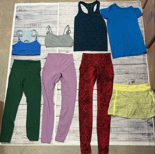 Women's Lululemon Lot of 8 Leggings, Skirt Tops and Sports Bras Size 4