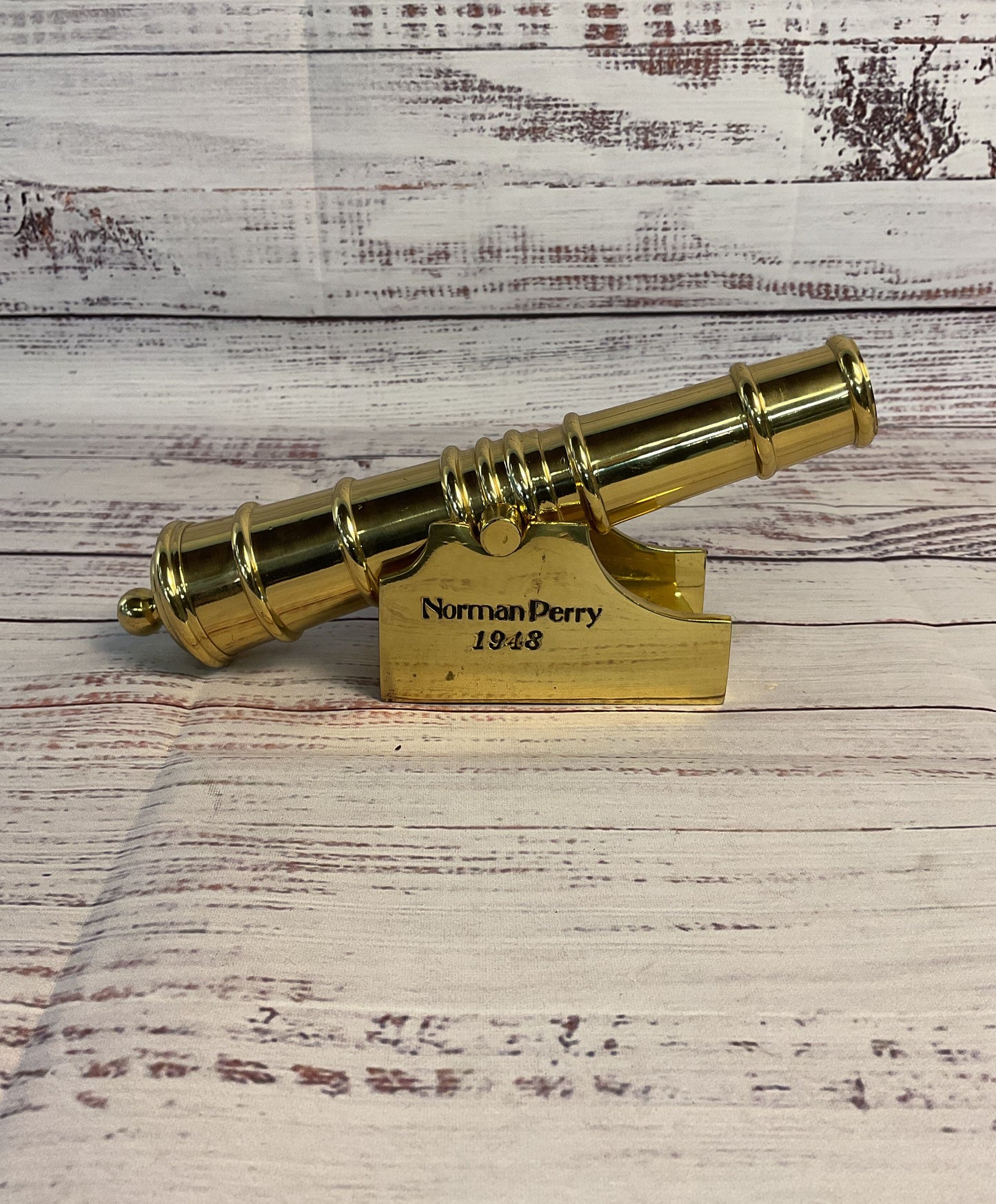 Norman Perry 1948 Gold Miniature Canon Statuette