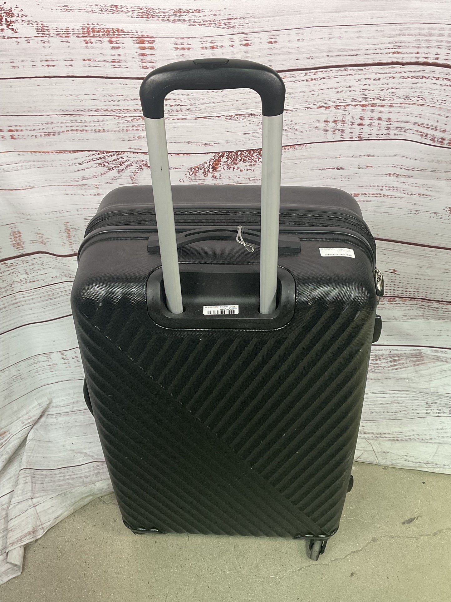 Samsonite Black Expandable Hard Shell Roller Suitcase