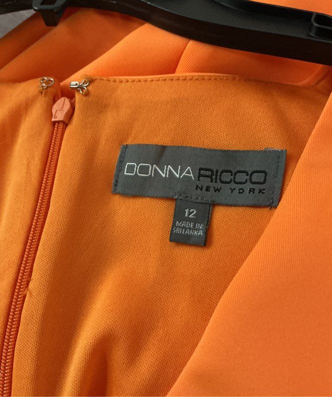 NWT Women's Donna Ricco Orange Dress with ruffled hem Size 12