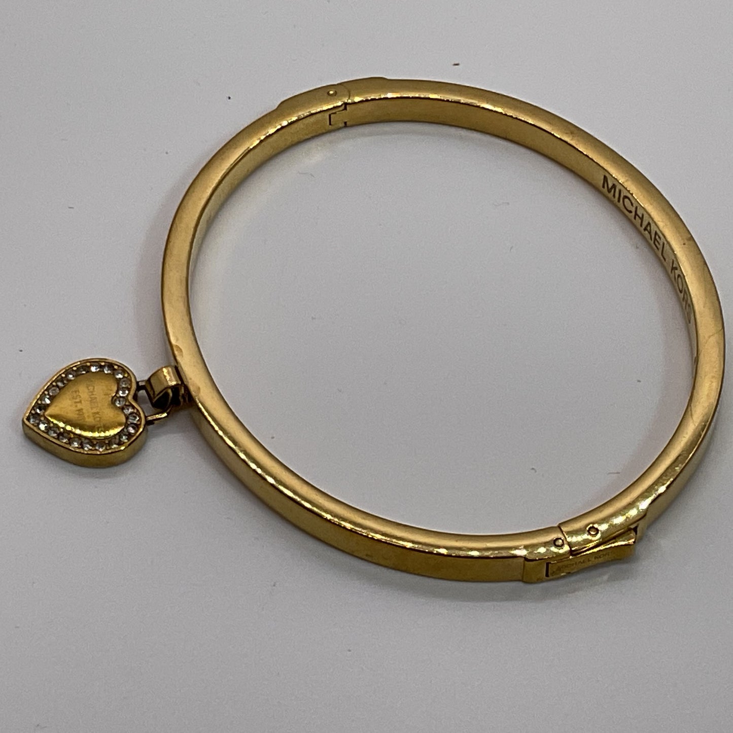 MICHAEL KORS Gold Tone & Rhinestone Dangle Heart Bangle Bracelet- 6.5"