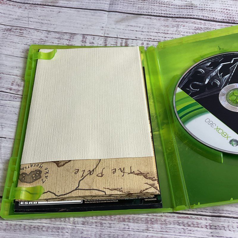 Microsoft Xbox 360 3 pc. Game Bundle (AC Brotherhood Batman Arkham City Skyrim)