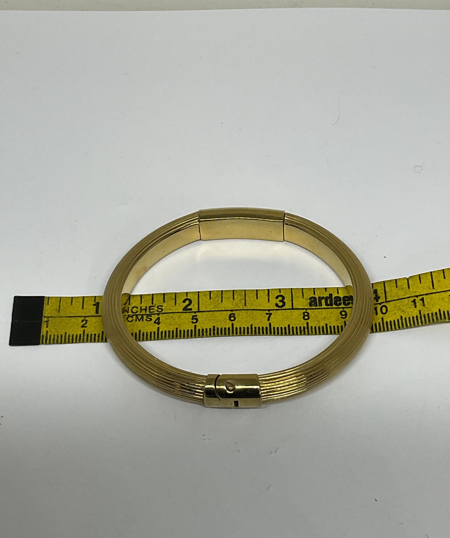 MICHAEL KORS Gold Tone Hinged Bangle Bracelet