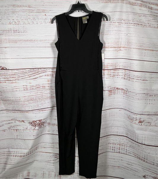 NWT Taylor Black Sleeveless Jumpsuit with bib overlay front Size 6