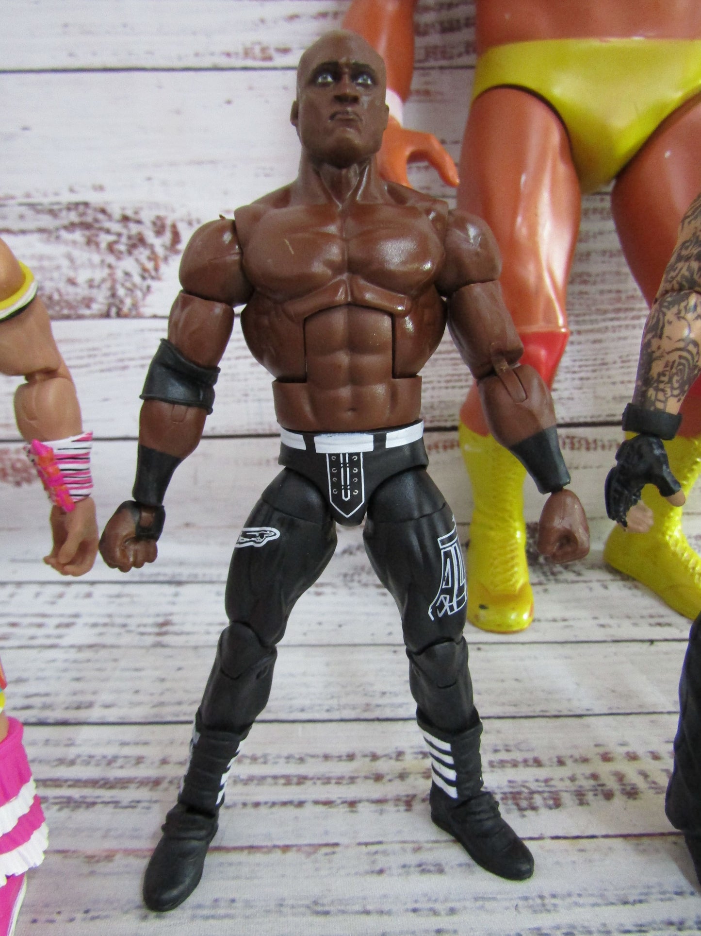 Lot of 6 WWE Action Figures Undertaker Bobby Lashley Macho Man Ultimate Warrior