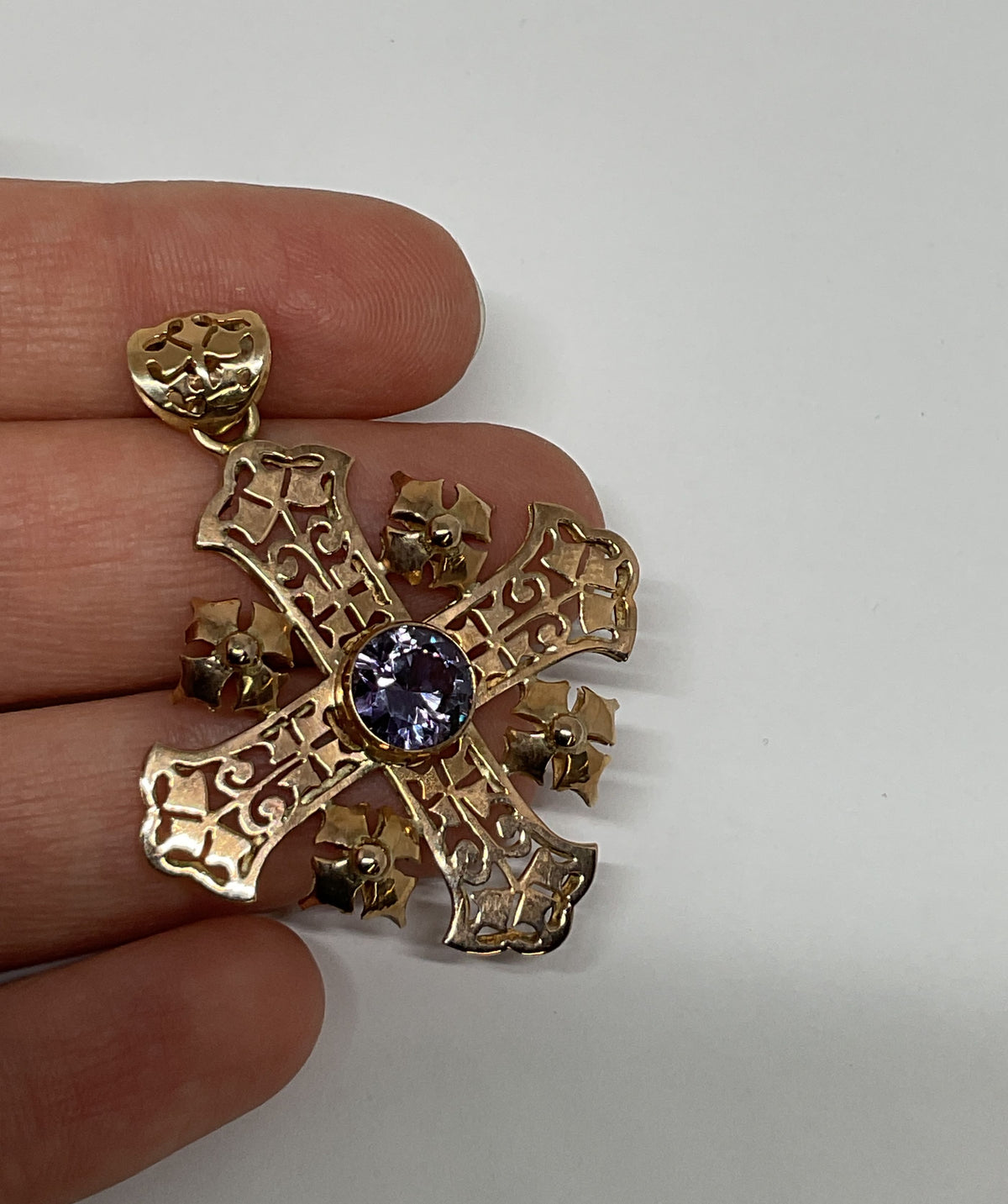 Ornate 14K Yellow Gold Cross Pendant with Purple Sapphire
