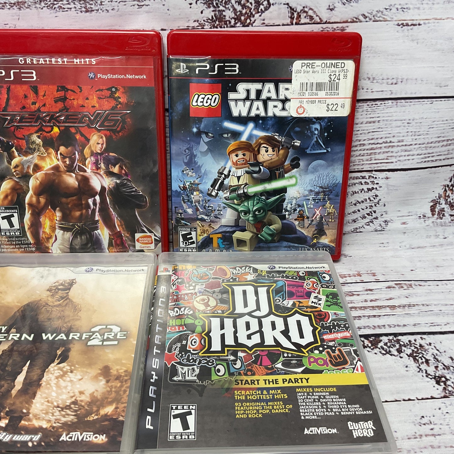 Sony Play Station 3 Mixed Games Lot COD MW2 Star Wars Little Big Planet Tekken 6