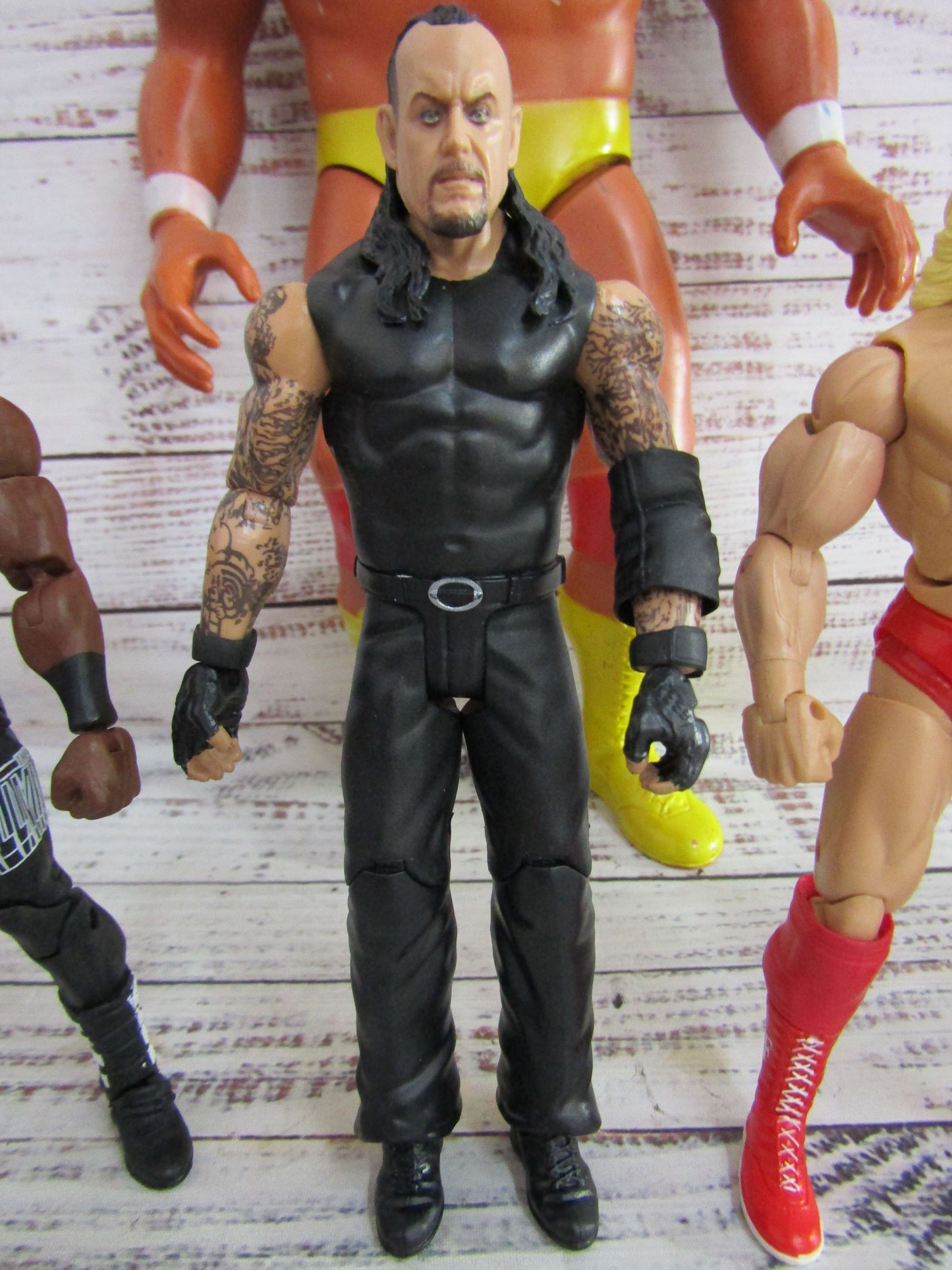 Lot of 6 WWE Action Figures Undertaker Bobby Lashley Macho Man Ultimate Warrior