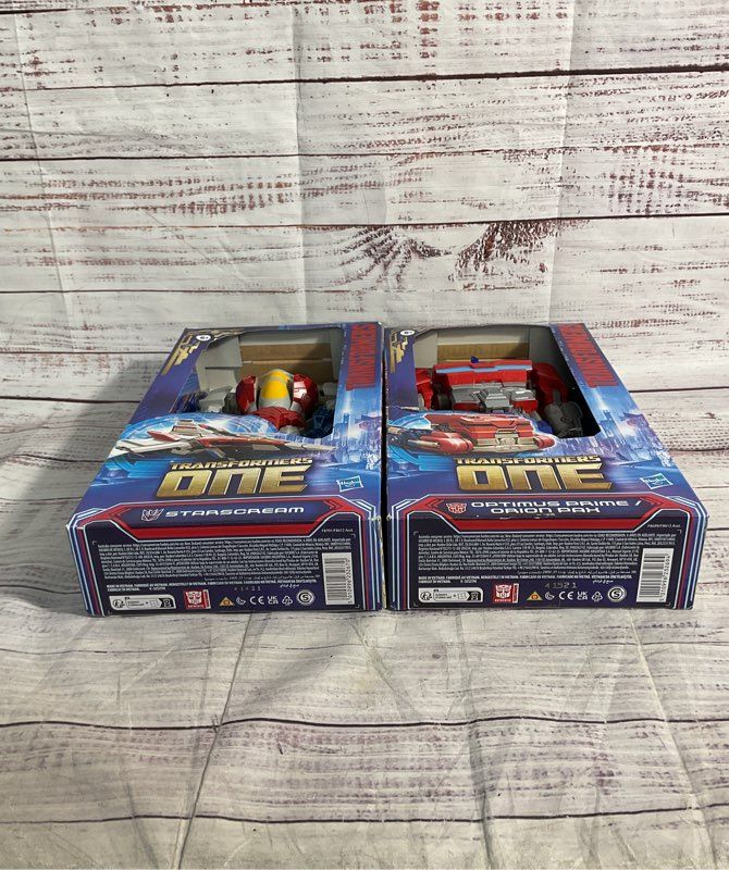 New Optimus Prime & Starscream Transformers One Action Figures Hasbro
