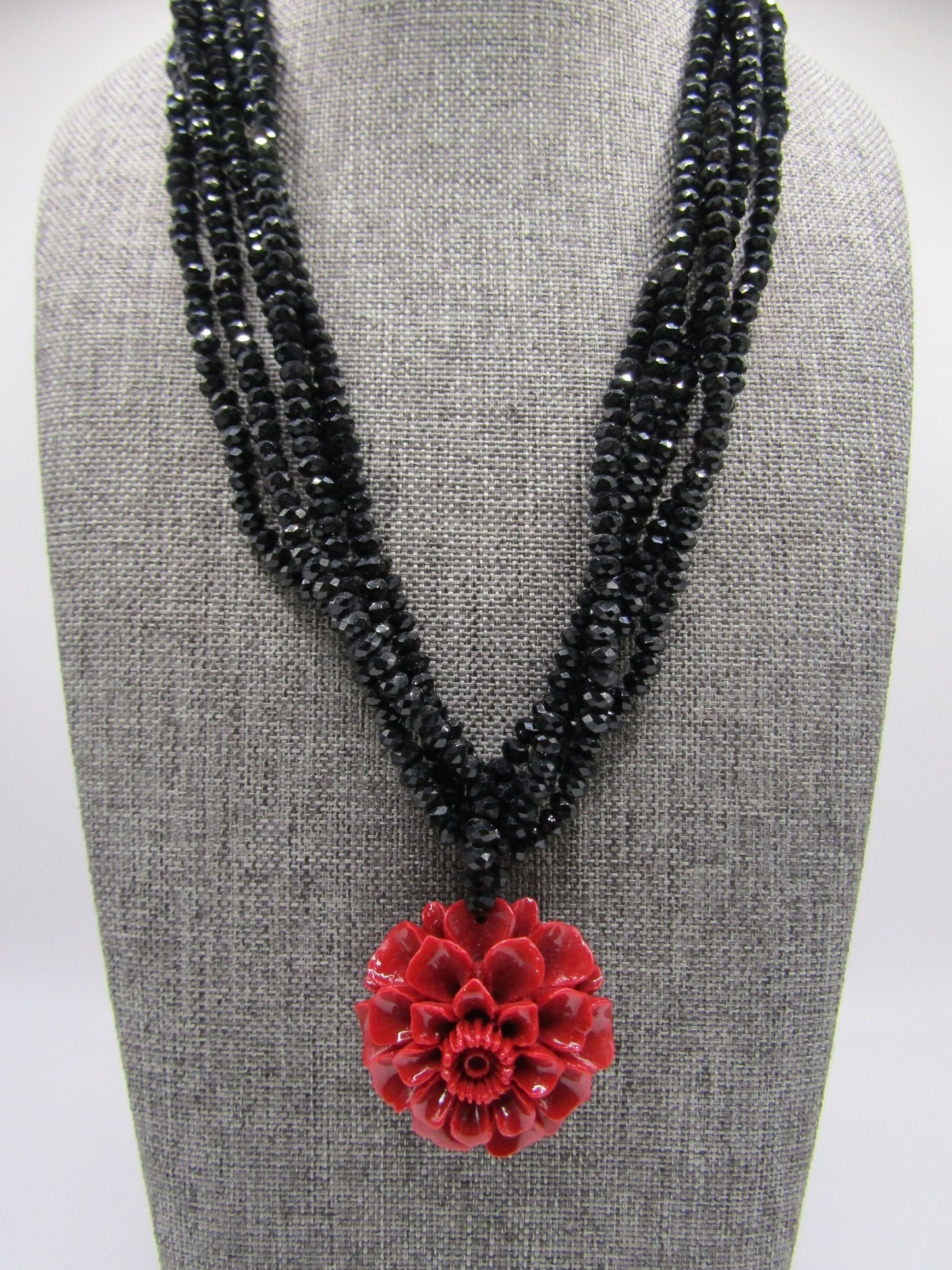 Handcrafted Multi-Strand Faceted Black Rhinestone Floral Carved Resin Necklace
