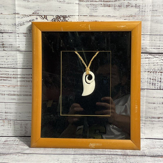 The Koru Bone Carving Sculpture by Watea Arts & Design, Framed