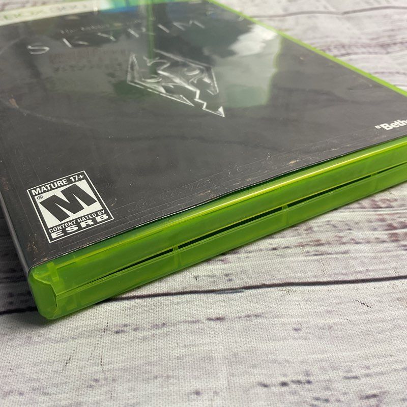 Microsoft Xbox 360 3 pc. Game Bundle (AC Brotherhood Batman Arkham City Skyrim)