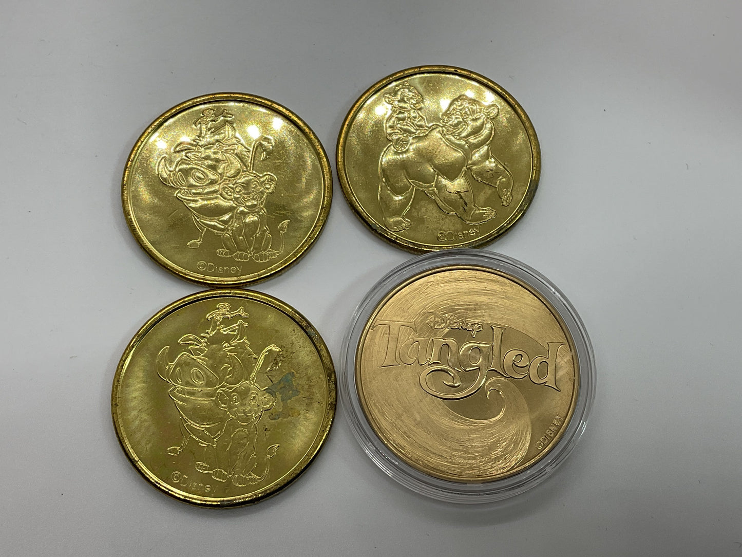 COLLECTIBLE Disney Lion King and Tangled Coins- Set of 4
