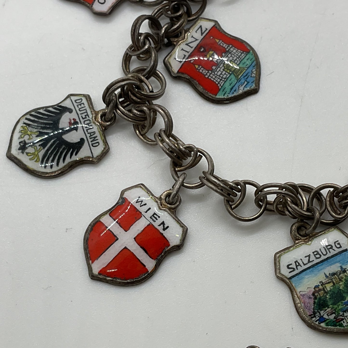 VTG. REU Germany 800 Silver 19 Shield Charms 7.75" Bracelet- 25.98g