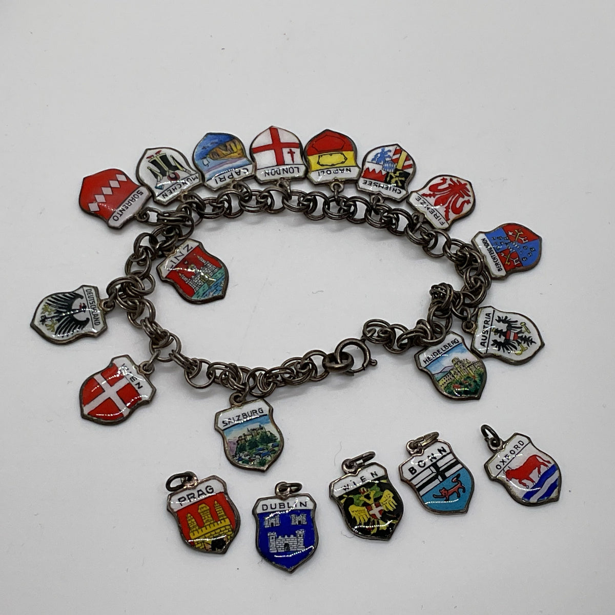 VTG. REU Germany 800 Silver 19 Shield Charms 7.75" Bracelet- 25.98g