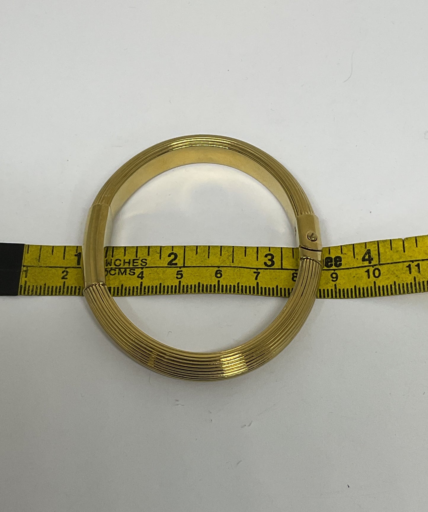 MICHAEL KORS Gold Tone Hinged Bangle Bracelet
