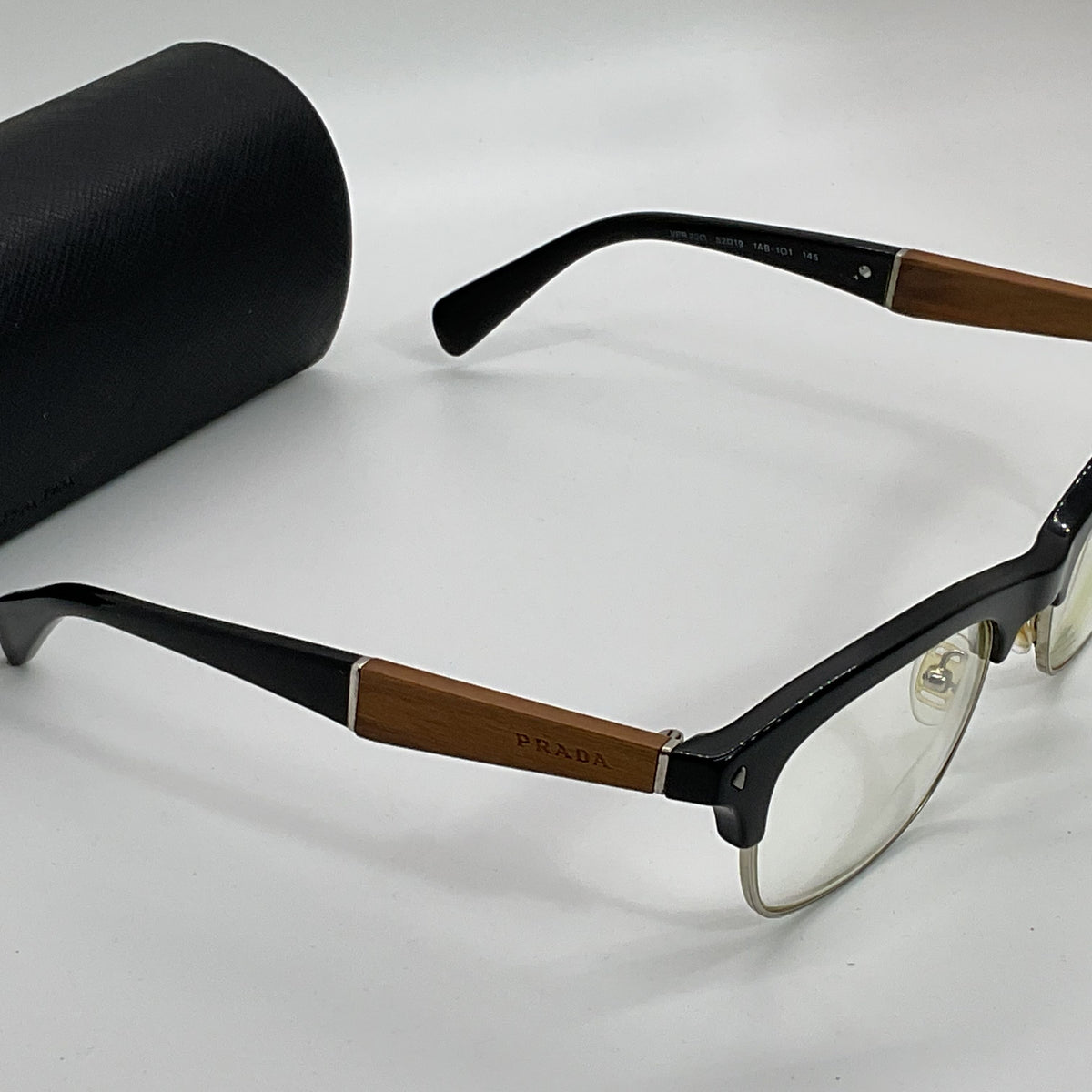 PRADA VPR220 Unisex Black/Brown Eyeglasses- 52[ ]19 145 (FRAMES ONLY)