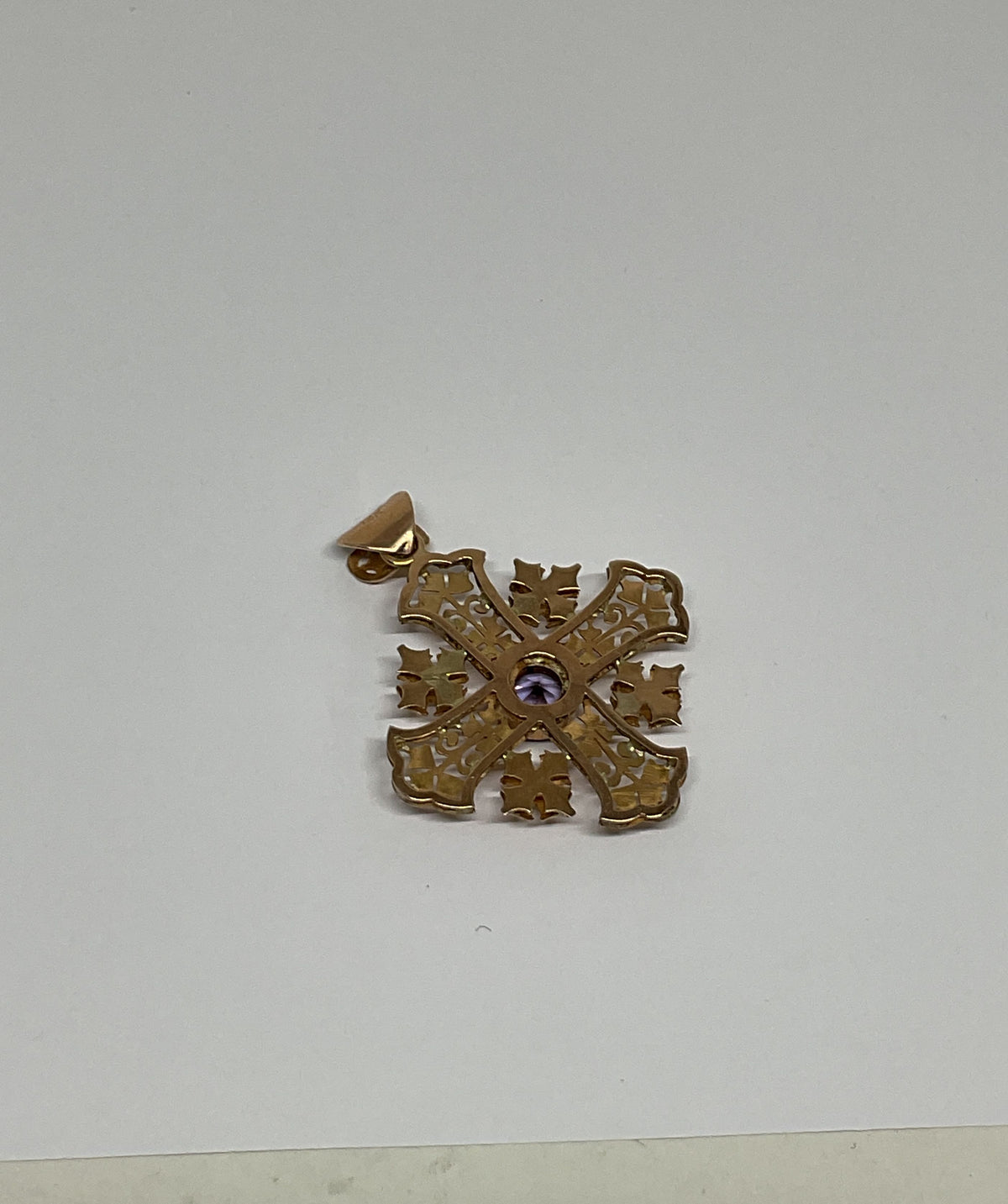 Ornate 14K Yellow Gold Cross Pendant with Purple Sapphire